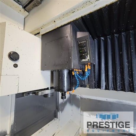 Okuma #Genos-M560-V, 41" X, 22" Y, OSP-300M, 32 automatic tool changer, part/tool probe, 4th Axis table, Chip - Image 5