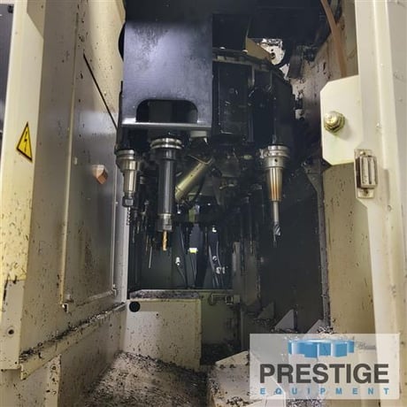 Okuma #Genos-M560-V, 41" X, 22" Y, OSP-300M, 32 automatic tool changer, part/tool probe, 4th Axis table, Chip - Image 8