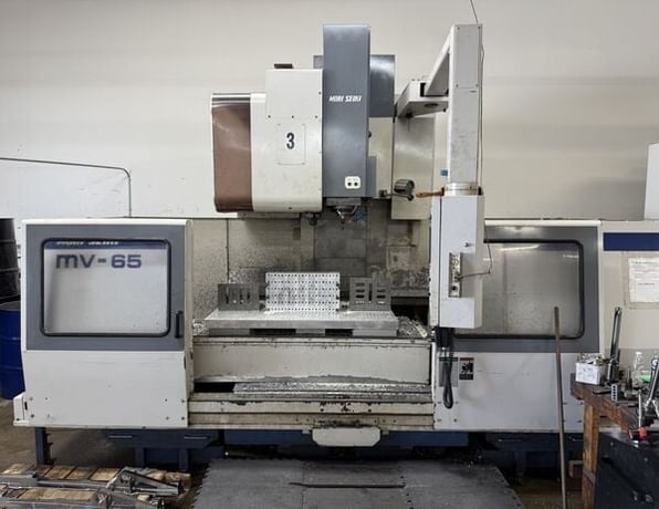 Mori Seiki #MV-65/50, CNC vertical machining center, MF-M6 Control, 65" X, 25" Y, 25" Z, 5000 RPM, #50 taper - Image 1