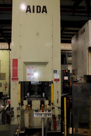 630 Ton, Aida #K1-6300, knuckle joint press, 8.66" stroke, 18.5" Shut Height, 1.94"adj, air clutch & brake - Image 1