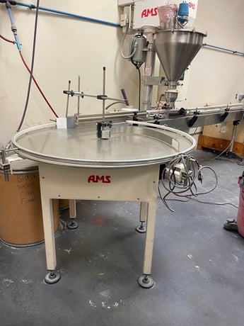AMS, filler, auger, single head, unscrambler, conveyor, accumulation - Image 4