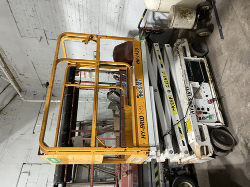670 lb. Hy-Brid #HB1430, scissor platform lift, 20' lift height, hand held controls, on board charger - Image 1