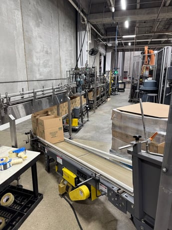 Pearson Packaging Systems, complete packaging system, made up of box erector, robot, palletizer & unscrambler - Image 4