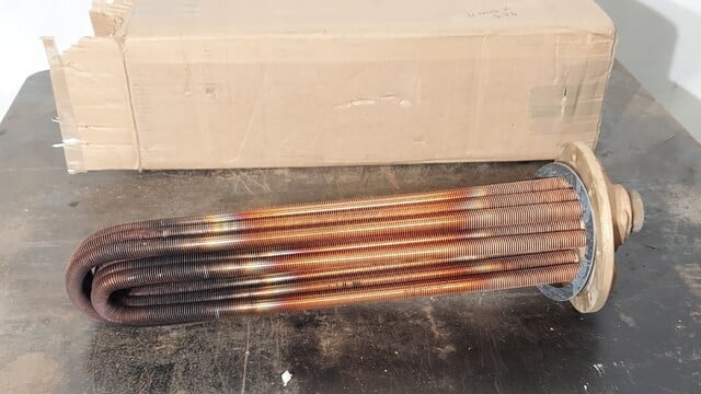 Motion Industries, shell & tube heat exchanger, 1-1/4"threaded inlet/outlet, new surplus - Image 1