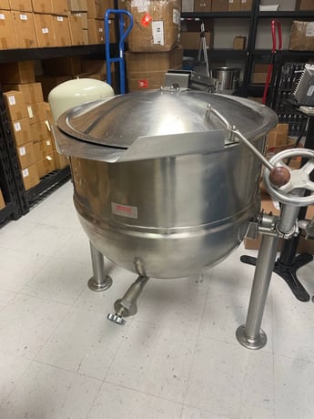 100 gallon Kettle w/ Leeson motorized Mixer, SteamJacketed Tilting, 316/304-4 Stainless Steel int/ext, 3 leg - Image 1