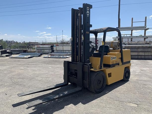 15000 lb. Caterpillar #T150D, forklift, propane fuel, cushion tires, 2-stage mast, 202" mast height, side - Image 8