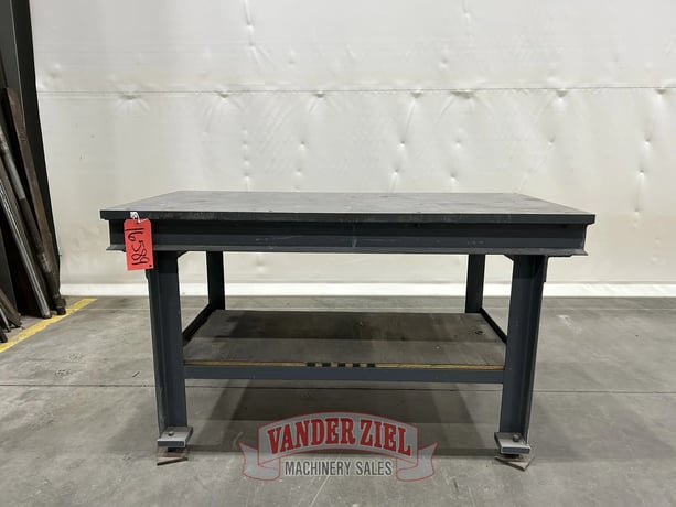 5.5' L x 2' width x 34.25" H welding table - Image 1