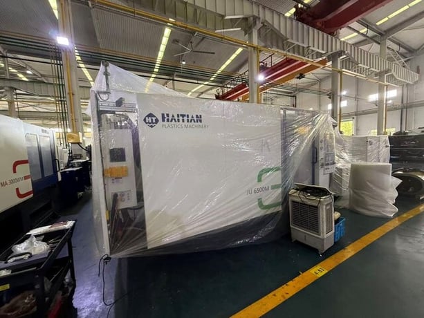 731 Ton, 18.31 oz., Haitian #JE6500M-1050-L380, multi-shot L configuration 2 platen injection molding machine - Image 1