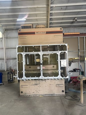 200 Ton, Standard #AP200, 4-post hydraulic straight side press, 12" stroke, 60" x 60" bed, 1999 - Image 1