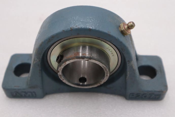 New open box ami pillow block bearing p207t stock h937a - Image 1