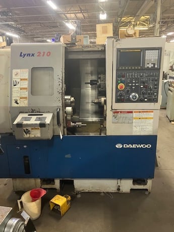 Daewoo Doosan #Lynx-210, CNC Lathe, Fanuc i Series, 18" swing, 20" centers, 1.7" bar, 3-jaw 6" hydraulic - Image 1
