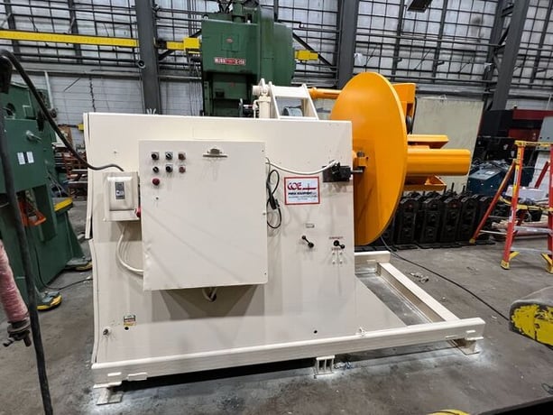 20000 lb. Coe Press Equipment, motorized uncoiler, 30" width, variable speed, holddown arm, hydraulic - Image 1