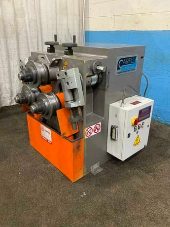 Comac #304HV, hydraulic angle rolls, leg-in/leg-out guides, 5 HP, 17 FPM, 2011 - Image 1