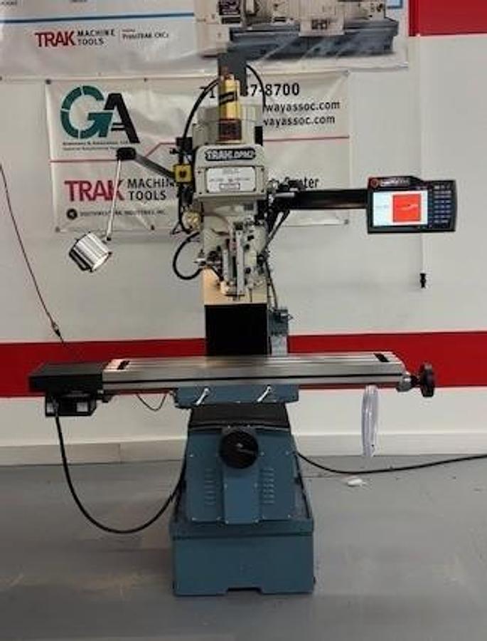 Trak #KX2, vertical bed mill, 9" x49" tbl., 3 HP, 31" X, 16" Y, 23.25" Z, 60-4200 RPM, R8, power draw bar - Image 1
