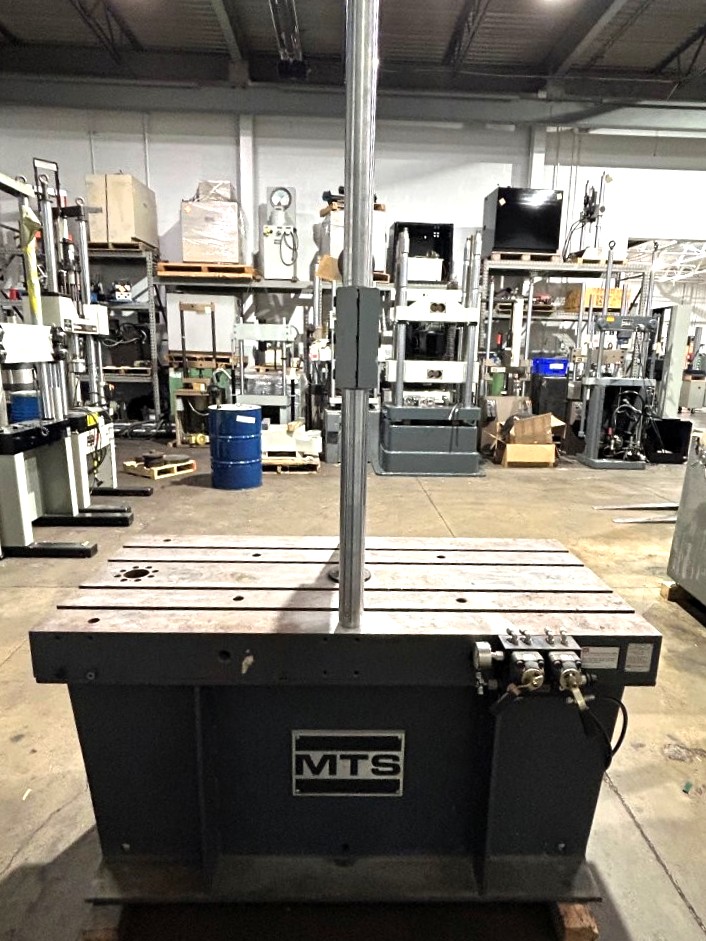22 KIP (100kN), MTS #322.21, 2 columns, 21" btwn columns, 60" x 21" T-slotted table - Image 1