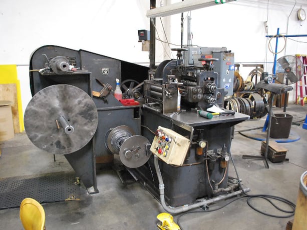 12" x 2-5/8" Ruesch #76, dual arm take up common base, #12673 - Image 1