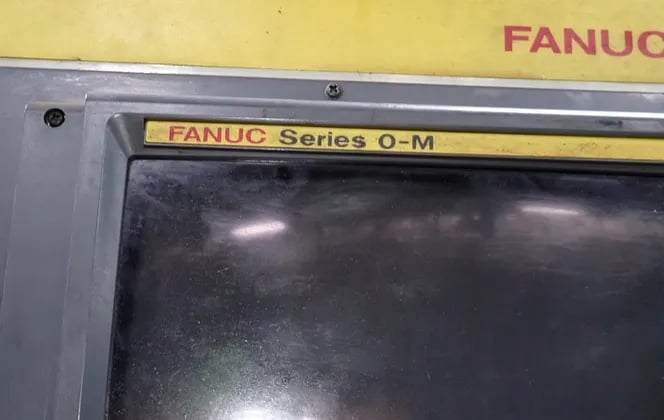 Fanuc #T, CNC vertical machining center, 15" x 27-1/2" capacity, Series O-M Control, 1990 - Image 7
