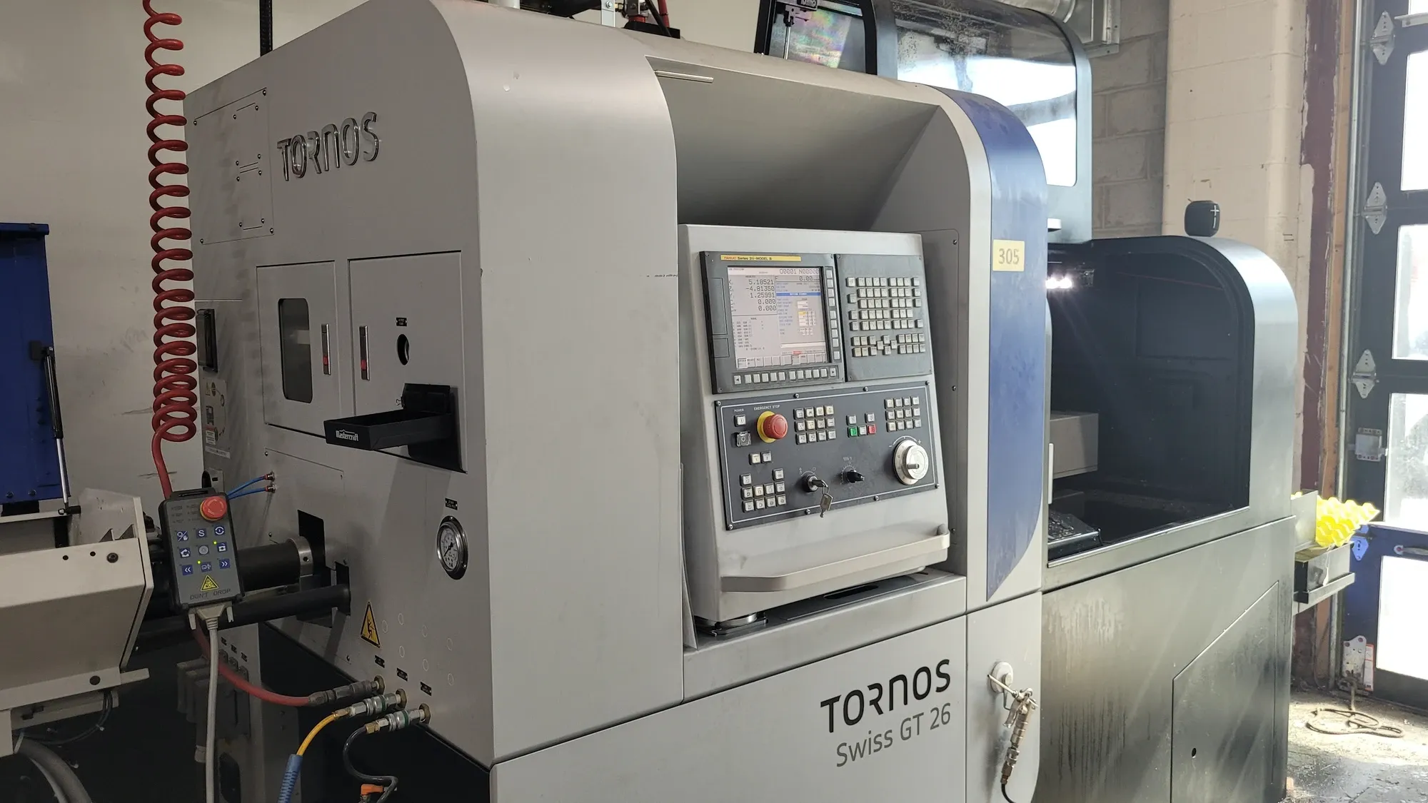 Tornos #Swiss-GT-26, CNC lathe, 1" diameter, Fanuc 31iB, 12' Iemca 325/12 sliding headstock barfeed, 2021 - Image 1