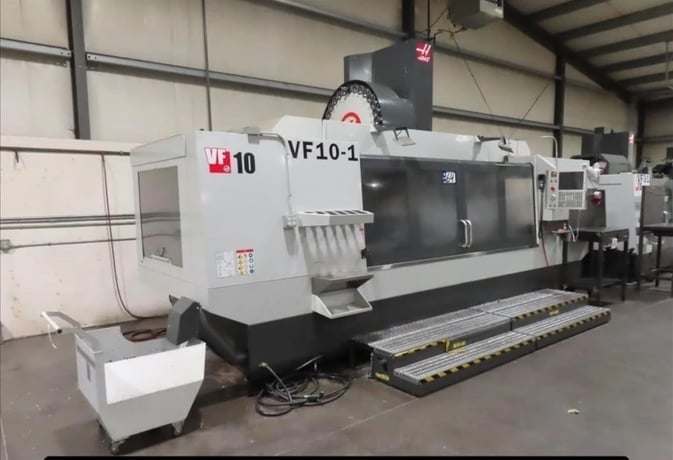 Haas #VF-10/50, CNC Vertical Machining Center, 120" X, 32" Y, 30" Z, 30 HP, 7,500 RPM, CAT 50, 30 automatic - Image 1