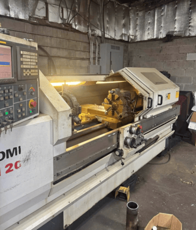 Romi #M20, CNC Lathe, 20" swing, 60" machining length, 12" chuck, 3" bar, 15 HP, 20.47" turning diameter - Image 1
