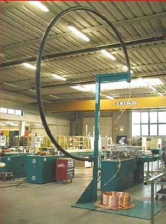 SMI #CF127, vertical overhead coiled tube uncoiler, 78" x 78" base structure, free standing design, 2018 - Image 1