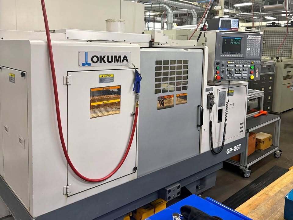 12.9" x 25.6" Okuma #GP-26T, CNC Cylindrical Grinder, 12.59" X, 25.59" Z, 20 HP, 24" diameter x 2.9" wide - Image 1