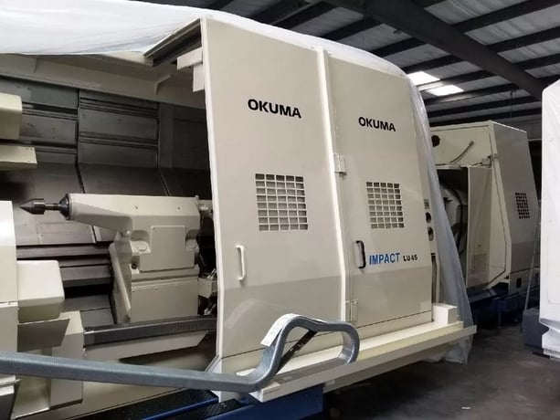 Okuma #Impact-LU45, 33" swing, 24" chuck, 10.2" bar, 121" centers, 23" diameter, OSP-E100L, 50 HP, 2002 - Image 2