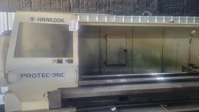 Hankook #Protec-9NC, CNC lathe, 37.4" swing, 9.8" bar, 24" chuck, 157" centers, 8 station turret, Fanuc - Image 1