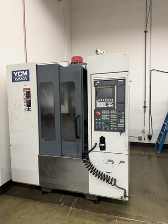 YCM #XV560A, vertical machining center, 22" X, 16" Y, 17.7" Z, 10,000 RPM, 20 automatic tool changer, CAT 40 - Image 1