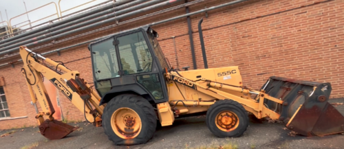 Ford New Holland #555C, tractor loader, 4WD, diesel engine, 85 HP, enclosure cab, Rear backhoe w/ stabilizers - Image 1