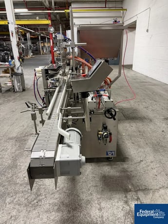 Accutek #AVF4-16, Inline Piston Filler, bottom up fill, slat conveyor, Delta Control, 2022 - Image 3