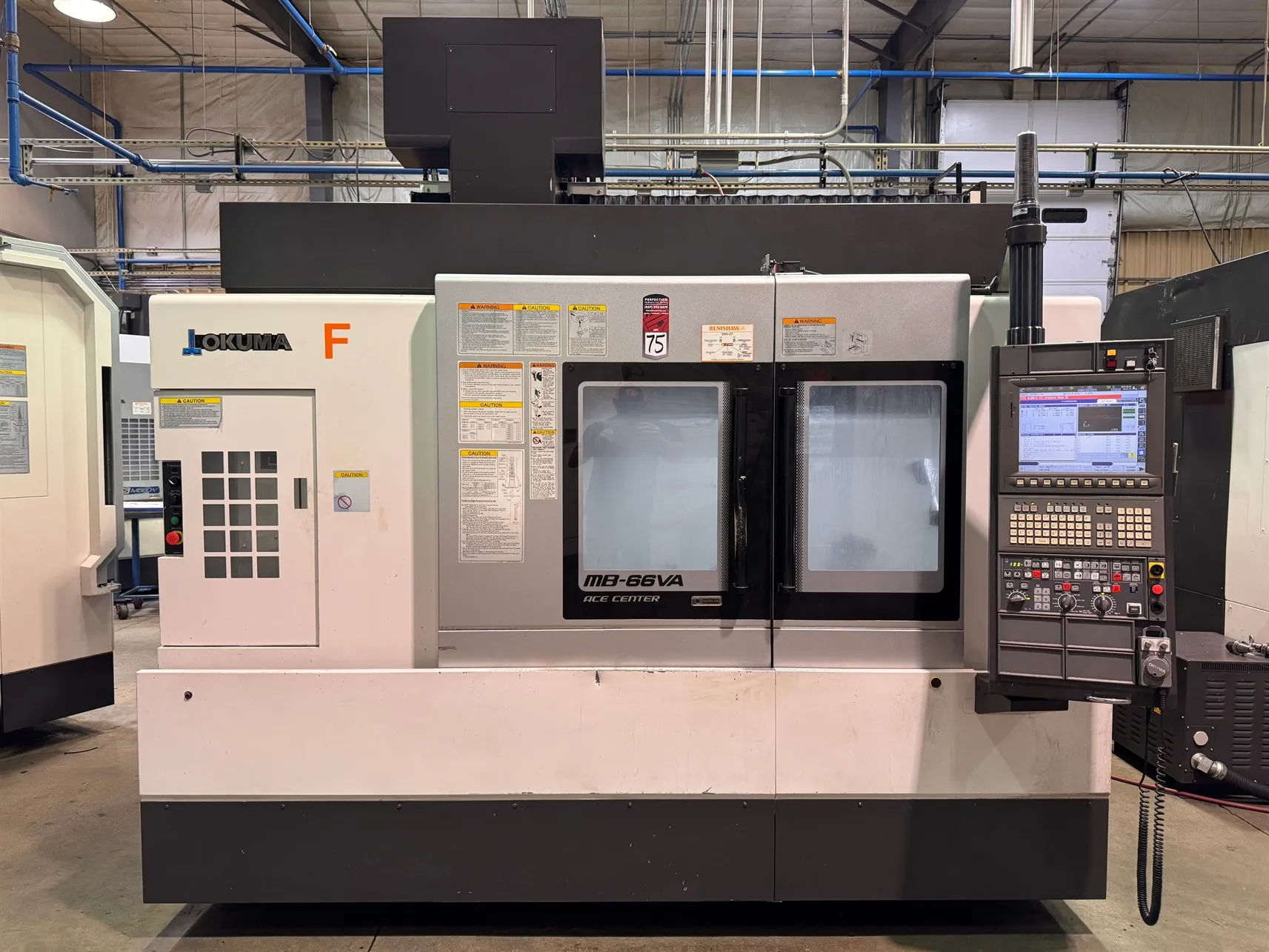 Okuma #MB-66VA, CNC vertical machining center, 32 automatic tool changer, 59" X, 25.9" Y, 25.9" Z, 15000 RPM - Image 1
