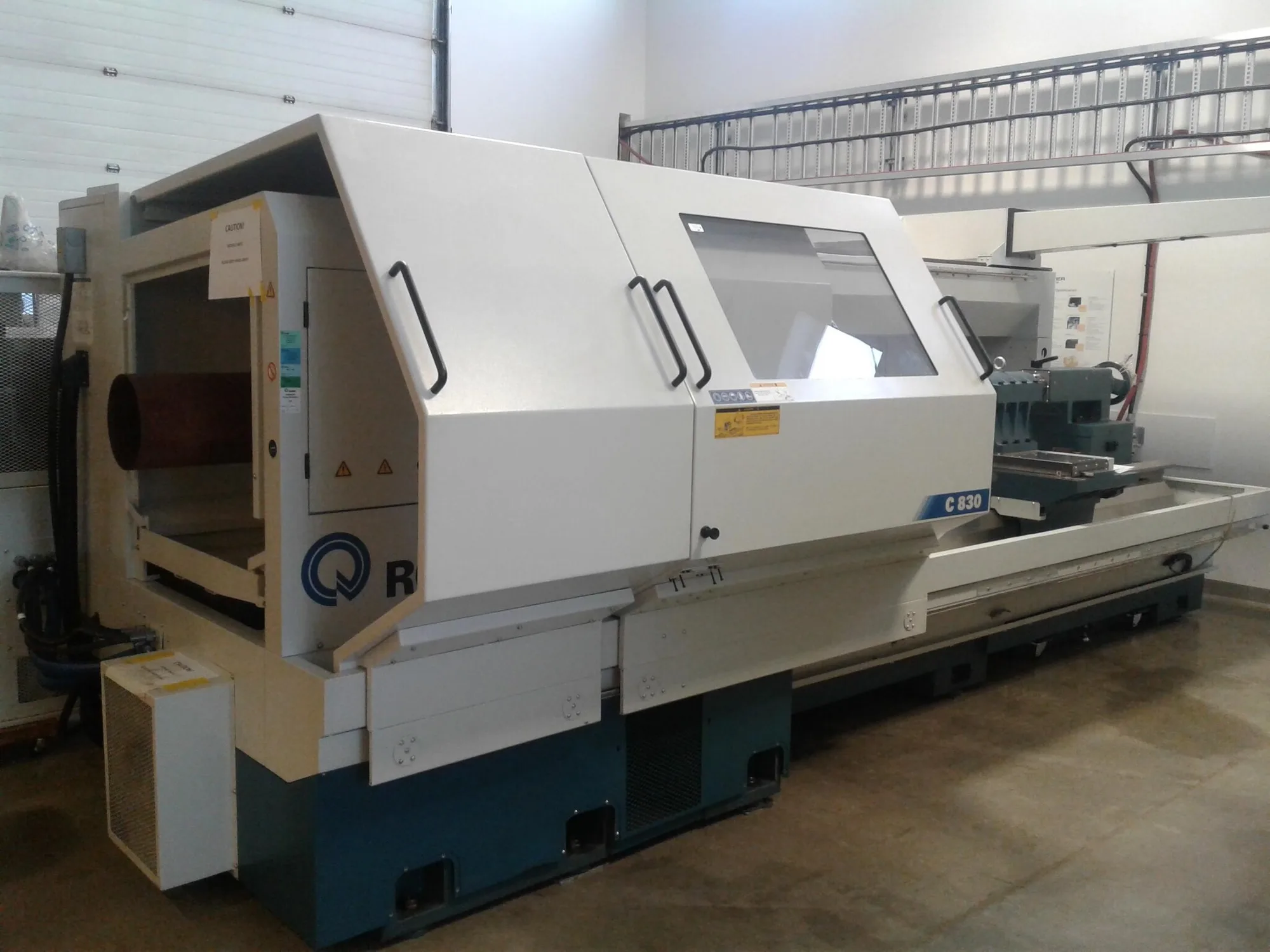 Romi #C830, CNC Lathe, 33.4" swing, 24" 4-jaw chuck, 21.6 " turning diameter, 10.2" bar, 775 RPM, Dorian tool - Image 1