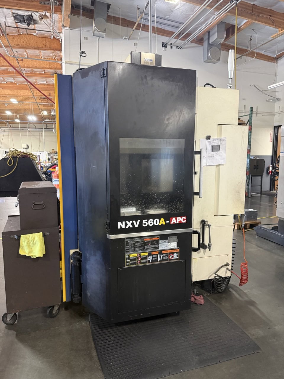 YCM #NXV560A-APC, vertical machining center, 22" X, 16" Y, 17.7" Z, 25 HP, 24 automatic tool changer, 12000 - Image 1