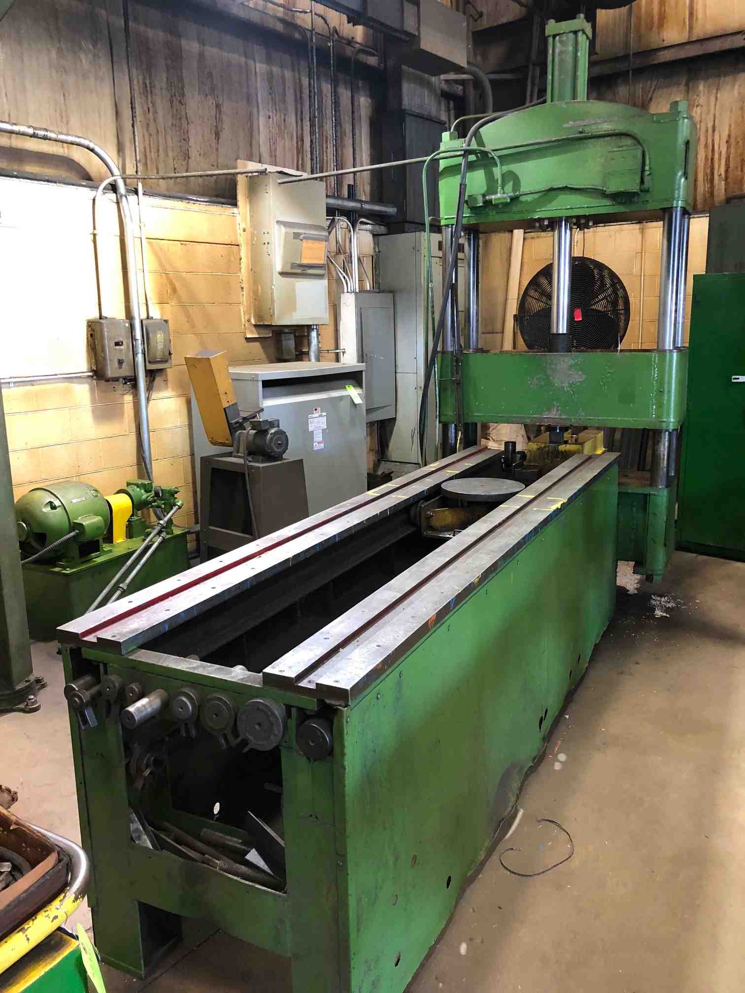 60 Ton, 4-post hydraulic straightening press, 23" stroke, 24" daylight, 42" x 18" table, 117" pneumatic run - Image 1