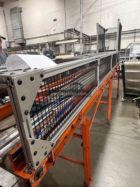 EMI, Belt Conveyor, aluminum extrusion frame, wire mesh side & hood guarding, telescoping legs on casters - Image 5