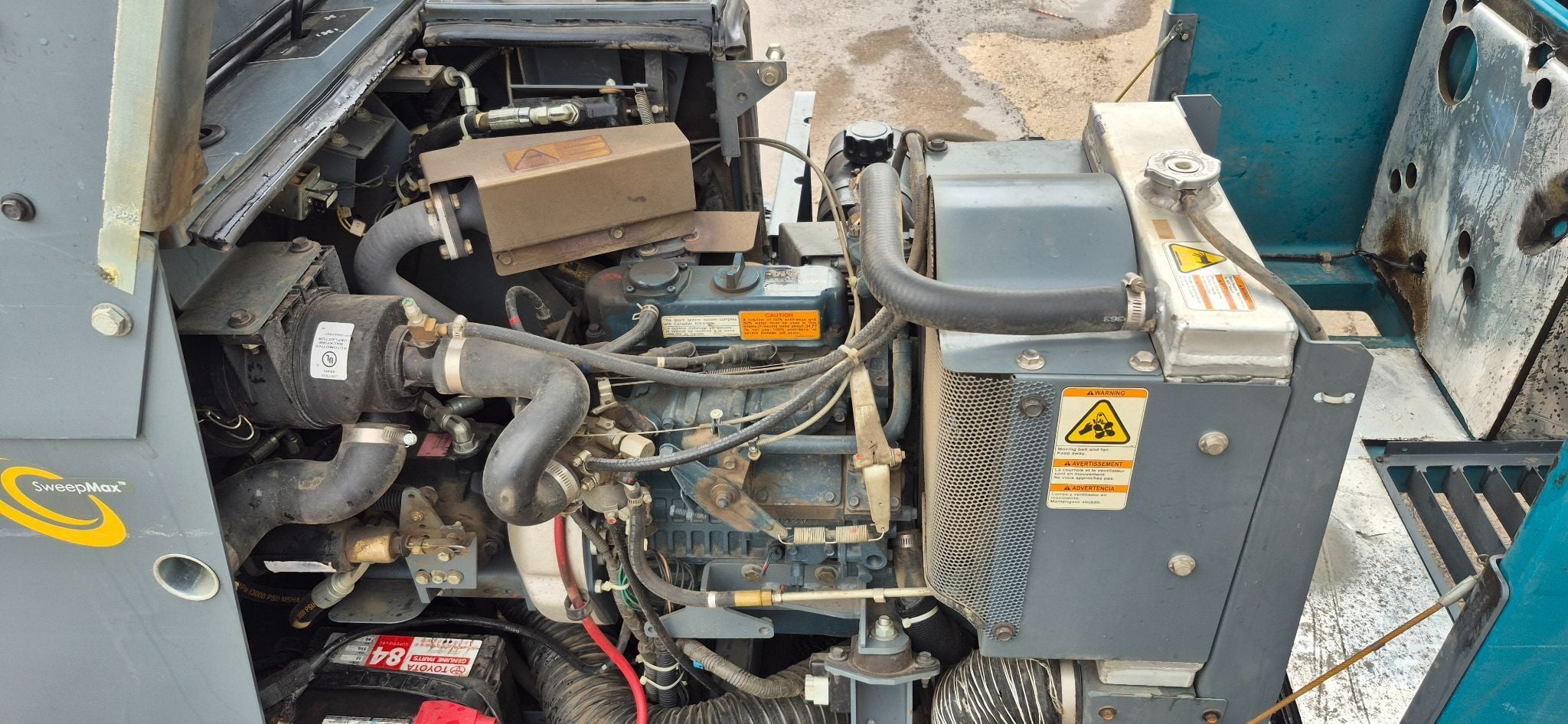 Tennant #S20, compact ride on sweeper, gas engine, 50" sweep path, 758 hours, 2012 - Image 10