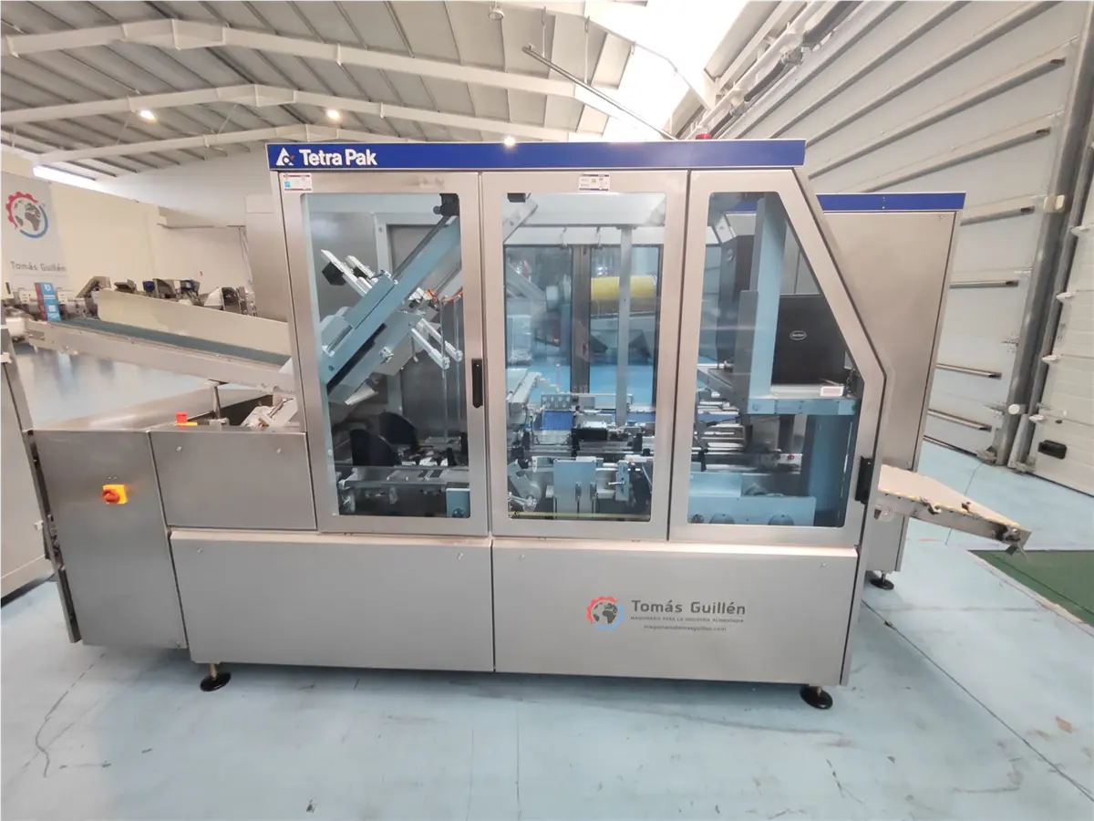 Tetra Pak #TCP-70, Tetra Cardboard Packer wrap-around case packer for bricks, 120 units/minute, Nordson gluer - Image 1