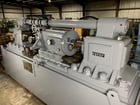 24" Tesker #840, infeed/thrufeed, 20' infeed rolling table, 20' exit rolling table - Image 1