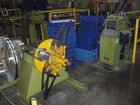 2500 lb. Aida, non-motorized uncoiler, 12" width, 48" outside dimensions, 16"-20" ID, 6 keepers - Image 1