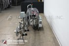Trine #4650, Stainless steel, roll fed, hot melt glue labeler designed to apply full or partial wrap labels - Image 4
