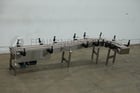 10" wide x 10.4' long, Keenline, Stainless Steel frame table top conveyor, 90° left hand turn, 1/2 HP drive - Image 1