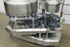 Federal #21-8, automatic, 21 head rotary, stainless steel, pressure gravity filler and 8 head rotary screw - Image 2