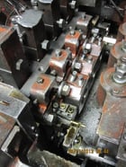 National #164, 4 die high speed nut former, 200 PPM, air clamping on feed rolls, 1988 - Image 2