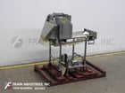 Multi-slicer with (3) 12" blades slicing product in segments - Image 1