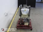 Multi-slicer with (3) 12" blades slicing product in segments - Image 3