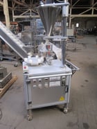 Yu Haw #P-206R, Powder Filling Rotary Filler, 6-Station, 15-30 pieces/min., w/cam table & bottle checking - Image 1