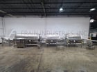 Lyco, complete inline cooker/cooler pouch pasteurizer with inclined belt feeder, complete line - Image 1
