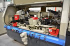 Weinig #U-23E, feed through moulder, 6-heads, 9-1/16" x 4-3/4" capacity, 1-9/16" spindle, variable speed, 2005 - Image 5