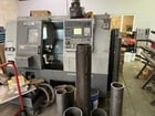 Hyundai Kia #SKT21, CNC lathe, 21.7" swing, 8" chuck, 2.5" bar, 13.8" turning diameter, Fanuc 21i-TB, 2007 - Image 4